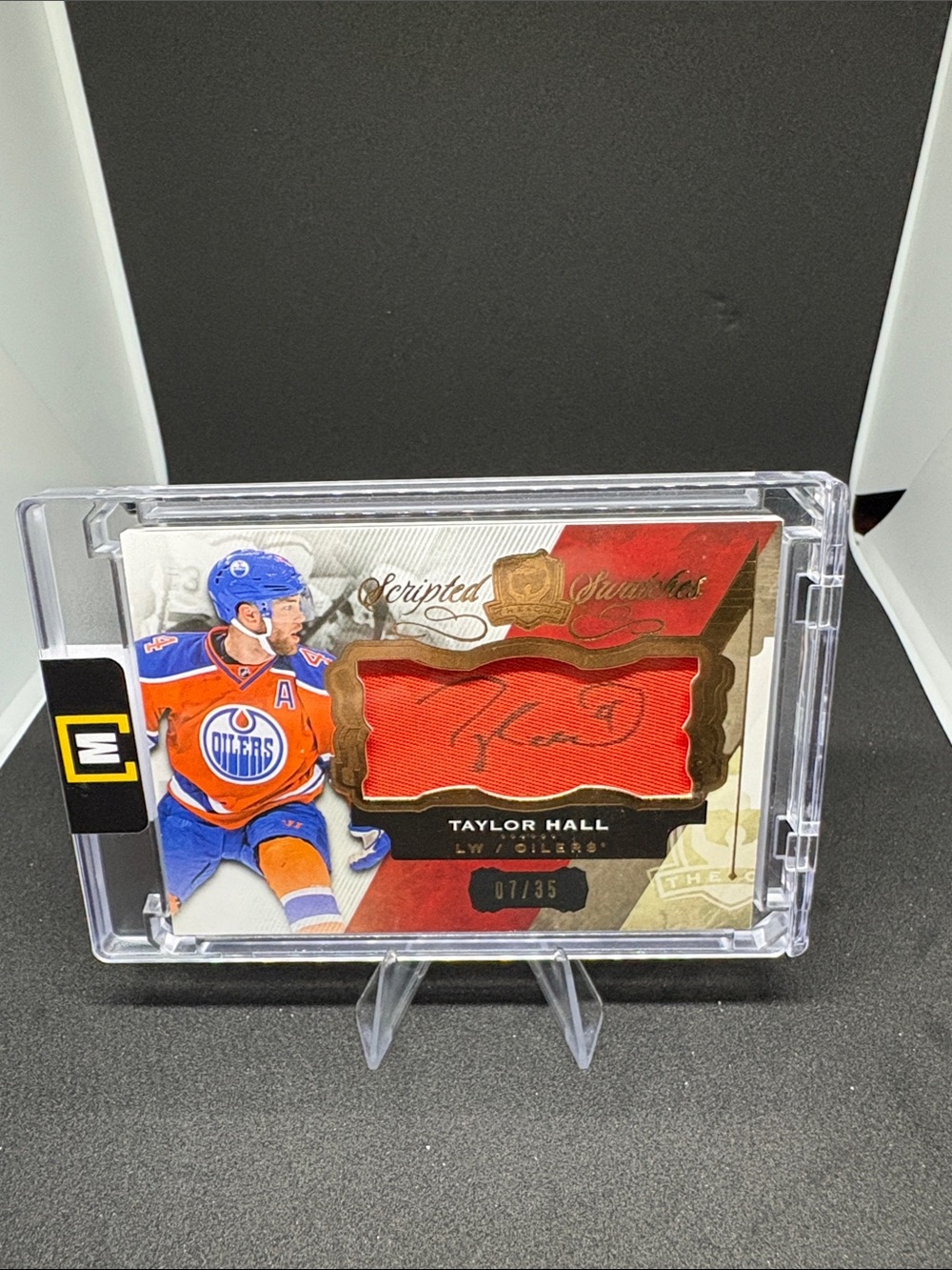 Upper Deck Taylor Hall Auto Memorabilia Trading Card with Jersey Swatch LE 7/35